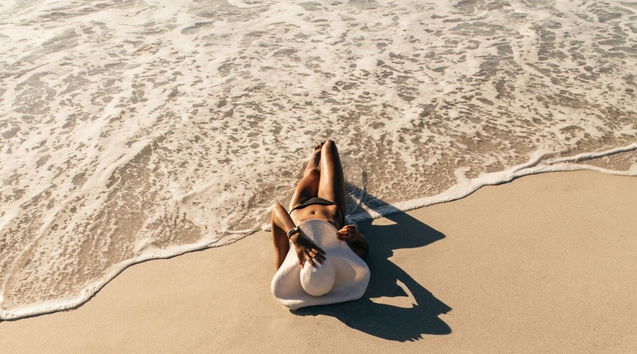 Can you still tan with sunless tanner on?