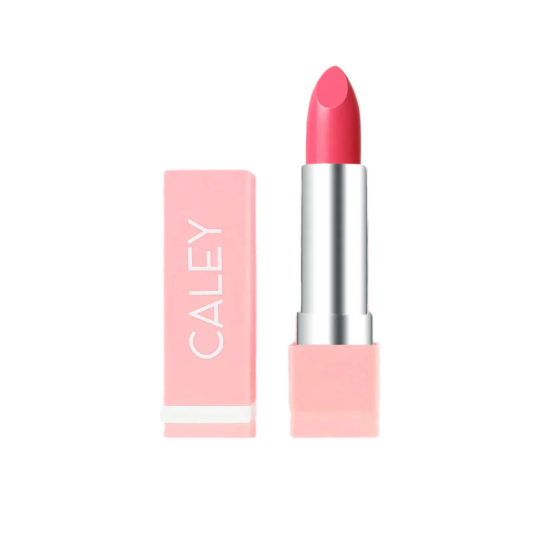 Pink creamy lipstick in a pastel tube from Caley Cosmetics, perfect for kids’ gentle play glam.