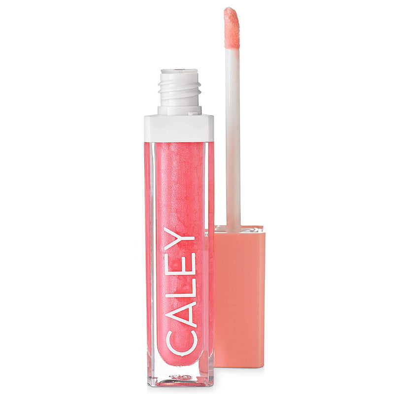 Shine Bright Natural Lip Gloss for Girls by Caley Cosmetics, a sheer glossy pink lip gloss in tube packaging.
