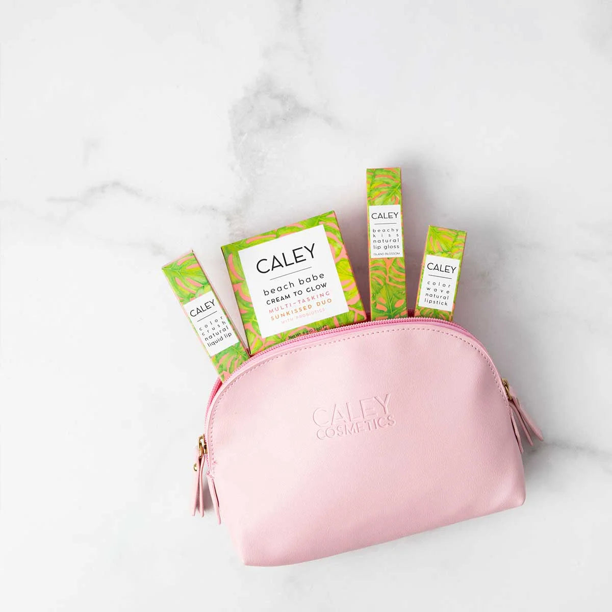 Elevate your beauty routine with the Vegan Leather Makeup Bag from Caley Cosmetics! This chic and eco-friendly kit not only adds a touch of sophistication to your vanity but also helps you stay organized. Perfect for storing all your favorite cosmetics, its sleek design and sustainable material make it a must-have for stylish, conscious beauty lovers. Get ready to glam up while making a positive impact on the planet!